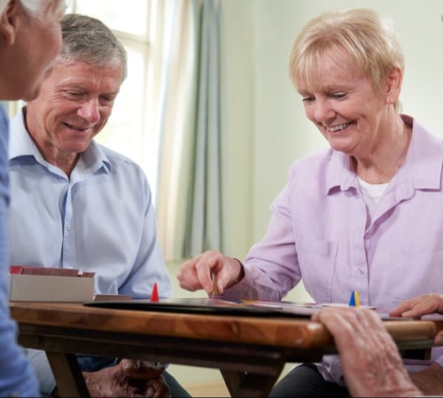 Seniors Playing Board Game